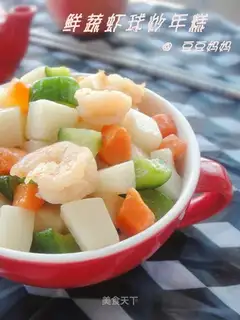Fried rice cake with fresh vegetables and shrimp balls
