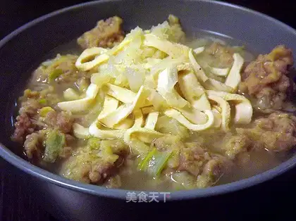 Dried bean curd, cabbage and meat balls soup