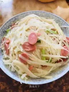 Homemade potatoes and ham sausages