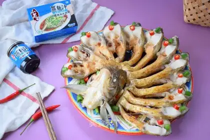 Peacock clears the steam fish