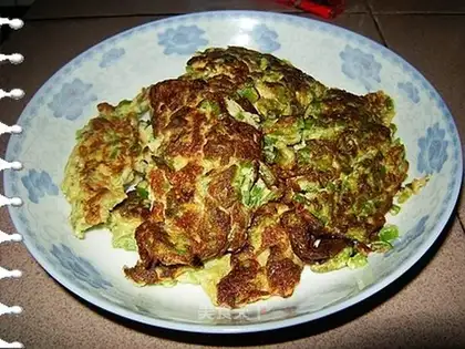 Fried eggs with green pepper