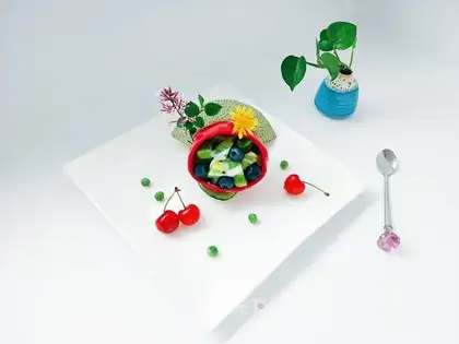 A croissant, blueberry salad