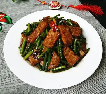Pig bloodballs burning garlic seed