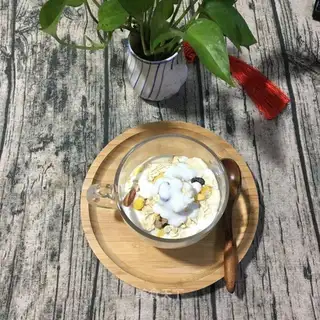 A cold nuts oatmeal milk cup