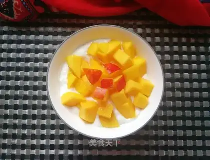 Peach mango yogurt bowl