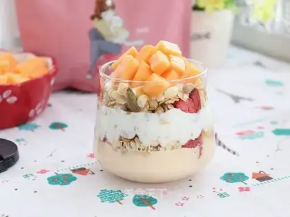 A papaya yogurt cup