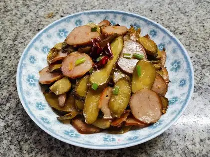 Sour cucumber with red sausage