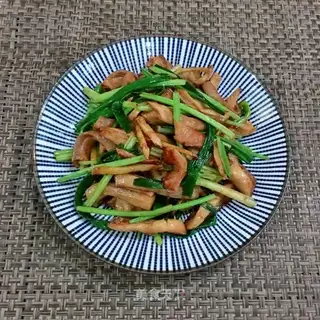 Celery fried pig belly