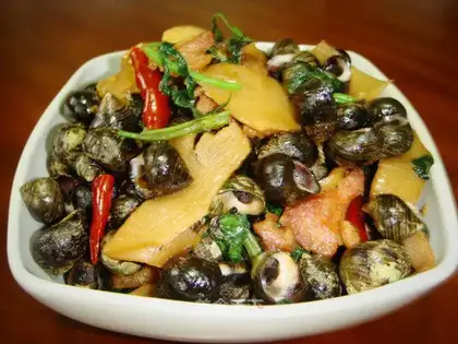 stir-fried stone snails with perilla and sour bamboo shoots