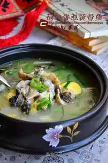 Boiled yellow bone fish with poached eggs