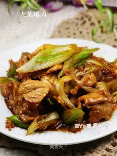 Fried pork with green onions