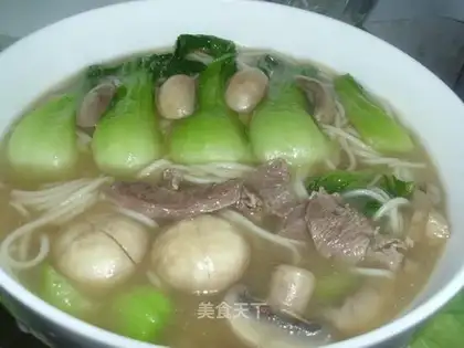 Noodles in beef soup with mushroom