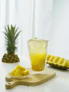 A glass of black pineapple