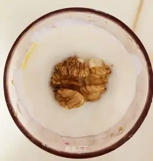 A walnut cup of yogurt