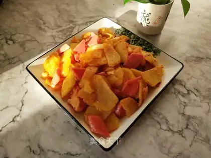 Roast potatoes, fried sausage