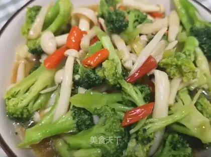 The broccoli with the white mushrooms