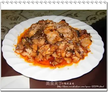 Grass carp meat in tomato sauce