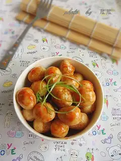 Quail eggs in tomato sauce