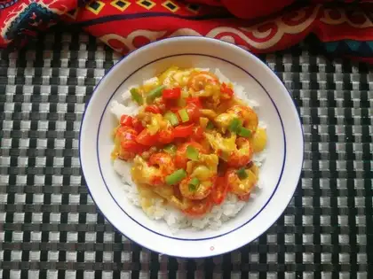 Curry, lobster-covered rice