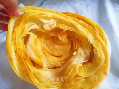 A hand tore a waffle