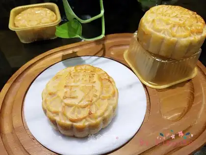 Two yellow lotion mooncakes