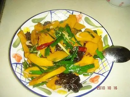 Fried pumpkin with green garlic