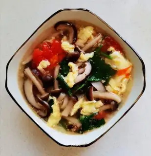 Tomato egg mushroom soup