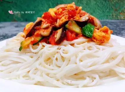 Spoon cucumber tomato egg noodles
