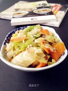 A cabbage with carrots