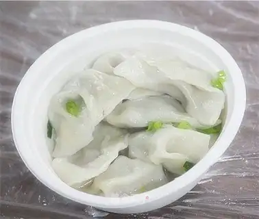 Dumplings stuffed with green pepper and pork