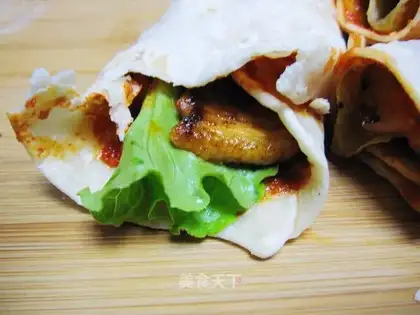 Pork and green vegetables roll