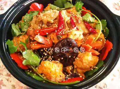 Spicy balsamic pot with pickled mustard and shrimp balls