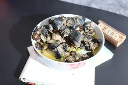 A chicken with mushrooms and cabbage