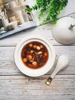 A silver spoon of red beans