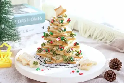 "Christmas cookies with tea and cream."