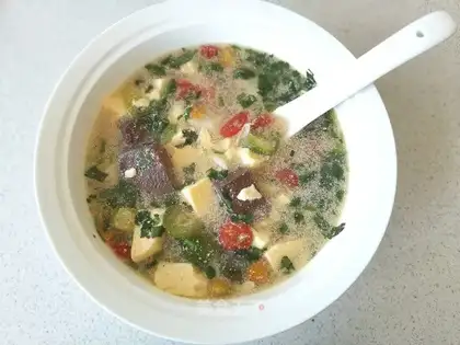 Soy milk eggs and duck tofu soup