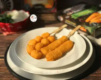 Old cake and cheese sticks