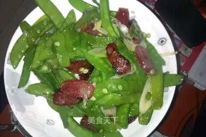 fried sausage with peas