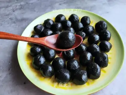 A hair with black sesame pills
