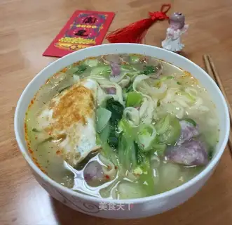 A green sausage egg noodles