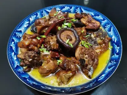A chicken with mushrooms