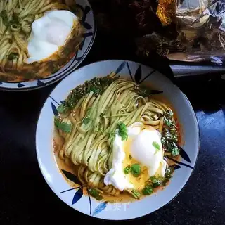 Sour eggs and spinach noodles
