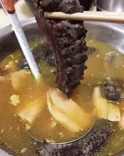 Sea cucumber olive chicken soup