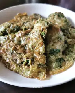 Fried eggs with sprouts