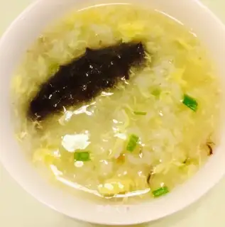 Sea cucumber corn and egg porridge