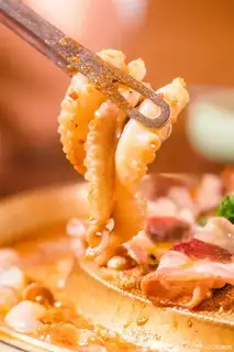 Family practice of octopus fried meat