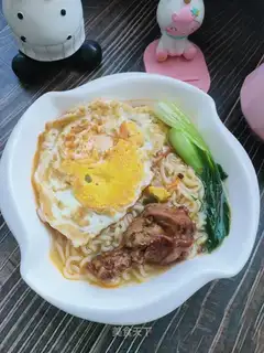 Chicken wing fried egg noodles