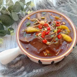 Golden mushrooms and pepper pig blood