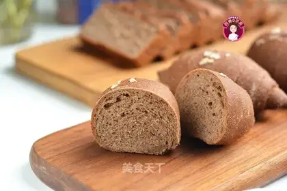 Black all-wheat toast and salt rolls