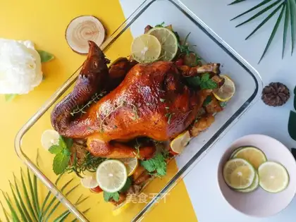 Baking the oven with lemon juice. The whole chicken
